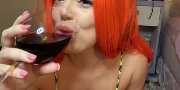 Drinking win and showing the goods