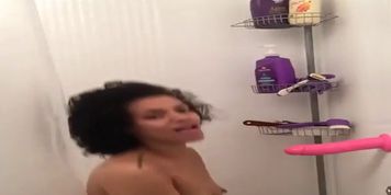 Having fun sucking and fucking my dildo in the shower