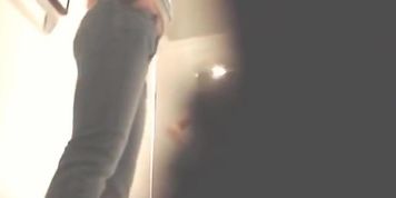 Fun with a naked girl in a shop changing room