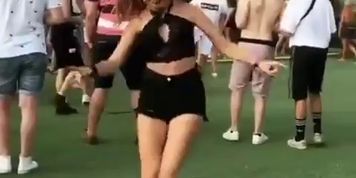 Beautiful hot sexy girl dancing on concert