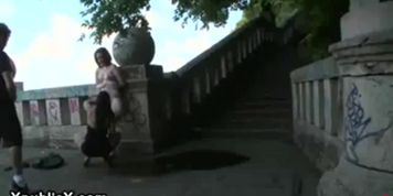 Bound babe smoke cigarette with pussy outdoor
