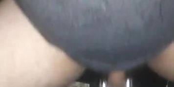 Riding a huge black dildo cumming hands free