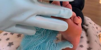Tortured by the tickling gloves