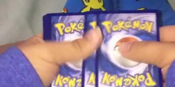 Teen Pok&eacute;mon Trainer opens pack and shows off feet and socks. Add onlyfans for more