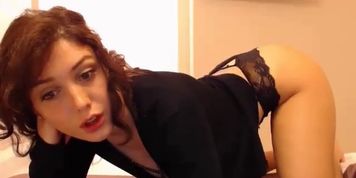 Brunette girl shows her nice tits and ass