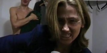 Woman reporter in mens locker room