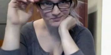 Nerdy blonde babe flashes in Library