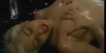 Oiled up girls sharing a double-header (Regan Senter)