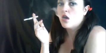 Sexy Mum chain smoking with dangles