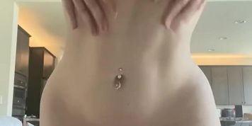 Emily Lynne lotioning up