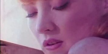 flame freckled redhead and other woman