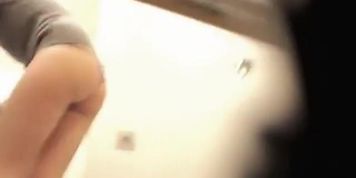 Putting on her pants girl flashed the round ass on spy cam