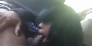 Ebony giving good sloppy head in the back seat
