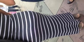 Fat ass Columbian in grey dress 2