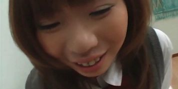 Innocent jap girl in school uniform flashes panties upskirt