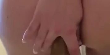 Curvy milf takes a dildo ride in her ass