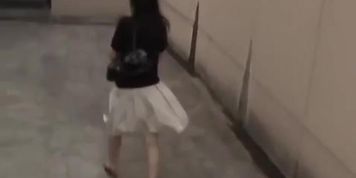 Fashionable bimbo wearing sexy skirt gets in the middle of sharking