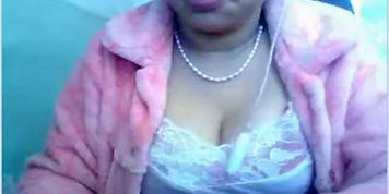 Mature Chinese housewife fingering pussy on webcam