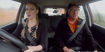 Busty pigtailed driving student bangs