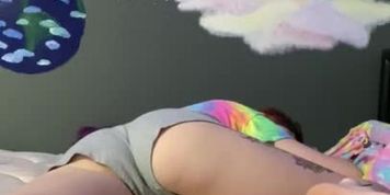 bed wetting in grey shorts