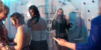 Slutty girls dancing erotically in a club