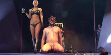 extreme fetish show on public show stage