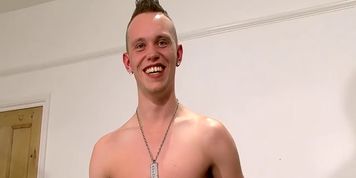 Young British twink with mohawk haircut Marco jerks off rough