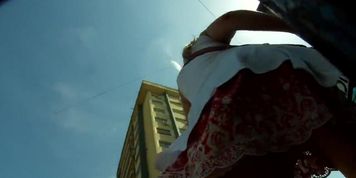 Hot sexy upskirt of beautiful blond girl walking with friend