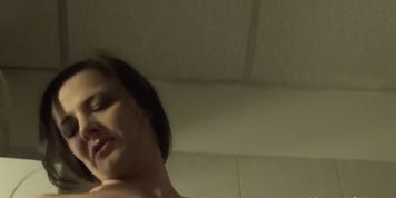 Playing with herself in the bathroom