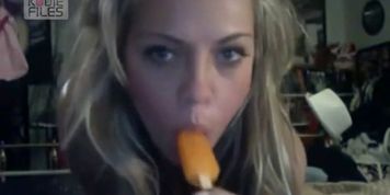 Amazingly sexy with with huge tits eating ice cream