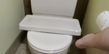 Trying to piss in the back of the toilet. Made a huge mess