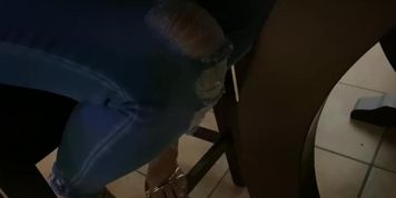 French blonde feet in sandals dangling 
