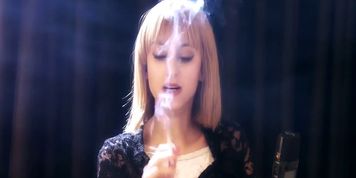 Gorgeous blonde girl Amara smoking sexy