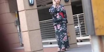 Black-haired small geisha flashes her boobs when someone pulls her outfit