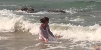 Naked Wet Girl at the beach