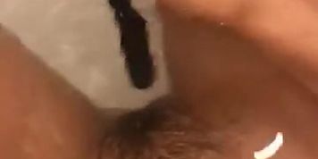 Bitch shoves makeup brush up her pussy