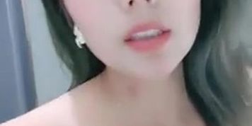Asian girl tease and masturbate