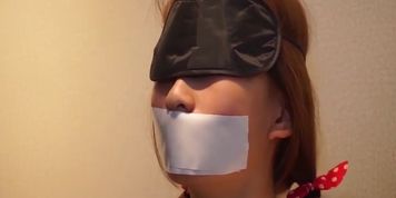 Chinese cute girl tape bondage
