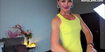 Milf flexing biceps