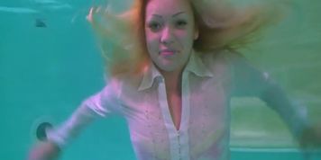 Blonde Underwater Breath Hold in Formal Wear