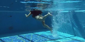 Hot petite big boobs star Diana Rius swims naked in the swimming pool