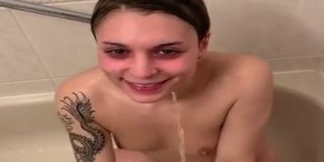Skinny slut drinks piss and sucks dick