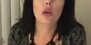 Busty brunette Cougar smoking & playing