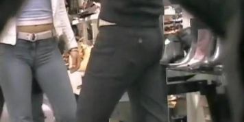 Busty girl in tight jeans caught on a candid cam