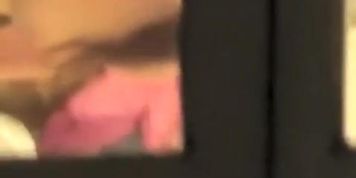Window voyeur spies neighbor in her bedroom