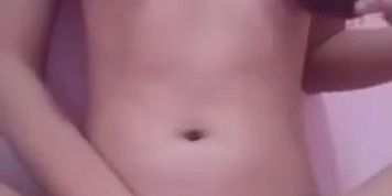 Tiny busty asian teen fingering pussy and rubbing it with brush while cumming