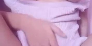 cute asian teen in pink rubbing pussy in panties