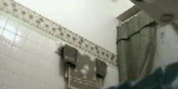 Blond big tit hidden bathroom cam
