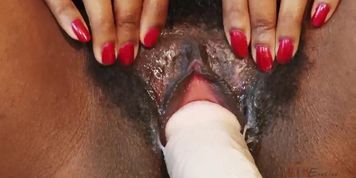 Sexy ebony Nina Devon takes on screw machine with a big dildo in her pussy to get it nice and wet