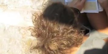 Girl in sun glasses quick downblouse peek on the camera